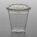 A 12 oz. clear plastic parfait cup with a flat lid.
