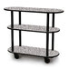 A Geneva three tier laminate serving cart with wheels and a gray sand finish.