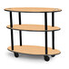 A Geneva 3 tier oval serving cart with maple finish and wheels.