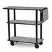 A black and gray Geneva serving cart with three shelves on wheels.