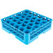 A blue plastic Carlisle glass rack with holes in it.