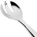 A close-up of a Sabert silver plastic serving fork with a handle.