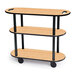 A Geneva oval serving cart with three laminate shelves on wheels.