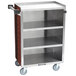 A Lakeside stainless steel utility cart with enclosed shelves and a red maple finish.