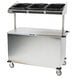 A silver Lakeside stainless steel vending cart with black plastic bins on a counter.
