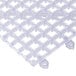 Clear plastic grid matting with interlocking pieces.