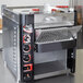 A black metal stacking kit for APW Wyott conveyor toasters.