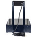 A navy blue metal box with a black wire on a metal stand.
