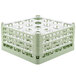 A light green Vollrath plastic glass rack with 16 compartments.