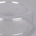 A Fabri-Kal clear plastic deli container with a lid.