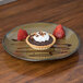 A TuxTrendz Artisan Mojave china plate with a chocolate tart, whipped cream, and strawberries on a wood table.