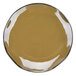 A brown Tuxton Artisan china plate with a white rim.