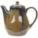 A brown and blue Tuxton TuxTrendz Artisan china tea pot with a lid and handle.