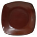 A brown square Tuxton Artisan China pasta plate with a white background.