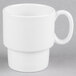 A Tuxton porcelain white mug with a handle.