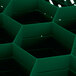 A green plastic Vollrath Traex glass rack with hexagon compartments.