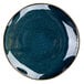 A close up of a Tuxton Artisan Night Sky china plate with a black rim.