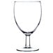 An Arcoroc clear wine glass with a stem.