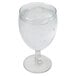 An Arcoroc goblet filled with ice water.