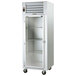 A white Traulsen G Series reach-in refrigerator with a left-hinged glass door.