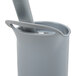 A grey plastic container with a Unger toilet bowl swab inside.