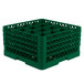 A green plastic Vollrath glass rack with compartments.