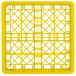 A yellow plastic Vollrath Traex glass rack with 16 compartments and a grid pattern.