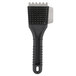 A black plastic brush with a black handle.
