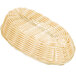 A Thunder Group natural-colored rattan oblong bread basket.