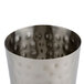 An American Metalcraft hammered stainless steel cup with holes in it.