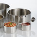 An American Metalcraft stainless steel bowl filled with food.