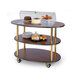 A Geneva three tier serving cart with a Victorian Cherry finish and an acrylic dome covering a cake.