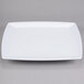 A white square Thunder Group melamine plate with a white rim.