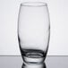 An Arcoroc Salto drinking glass on a reflective surface.