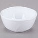 A white Thunder Group melamine bowl with a small rim on a gray surface.