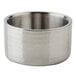 An American Metalcraft stainless steel bowl with a textured surface and a handle.