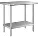 A Regency stainless steel work table with undershelf and legs.