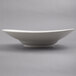 A 10 Strawberry Street Whittier white porcelain shallow oval bowl.