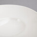 A close-up of a 10 Strawberry Street Whittier white shallow oval bowl.