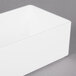 A white rectangular Cal-Mil melamine box on a gray surface.