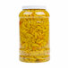 A jar of Del Sol Hot Banana Peppers filled with yellow peppers.