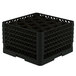 A black plastic Vollrath Traex glass rack with 20 compartments and holes.