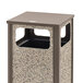 A Rubbermaid square steel trash can with a square flat top and stone panels on the sides.