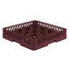 A Vollrath burgundy glass rack with 16 compartments in a red plastic basket.