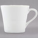An Arcoroc white coffee/tea mug with a handle.