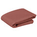 A stack of folded mauve Intedge square table covers.