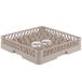 A beige Vollrath Traex glass rack with 20 compartments holding clear glasses.