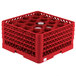 A red Vollrath Traex glass rack with 20 compartments and an open rack extender.