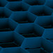 A blue plastic Vollrath Traex glass rack with hexagons.