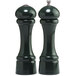 Two Chef Specialties pepper mills with green handles.